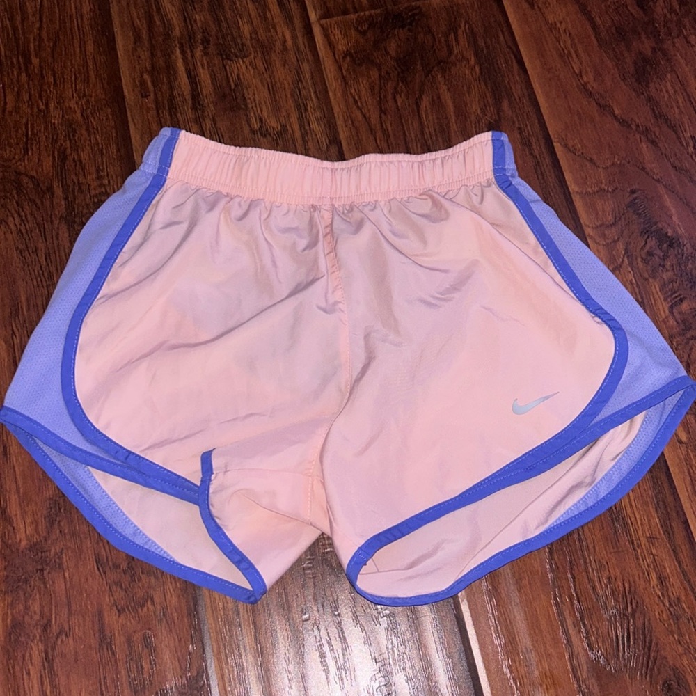 Nike dri-fit shorts in a light pink
